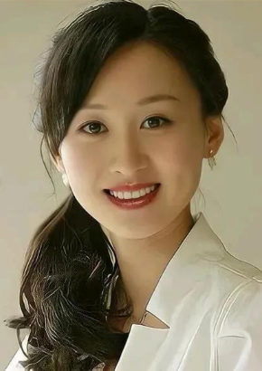 练束梅